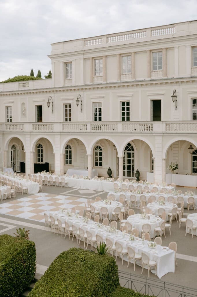 A reception area set up by destination wedding planner, Wild Heart Events, is photographed at Villa Miani in Rome 
