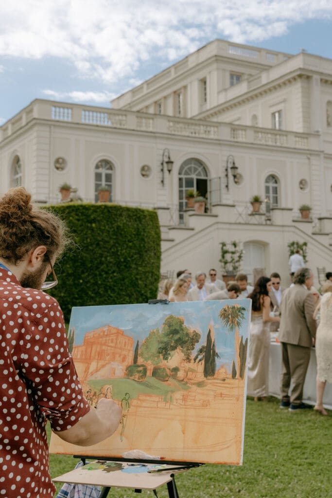 An artist paints guests at a wedding reception held at Villa Miani Rome 