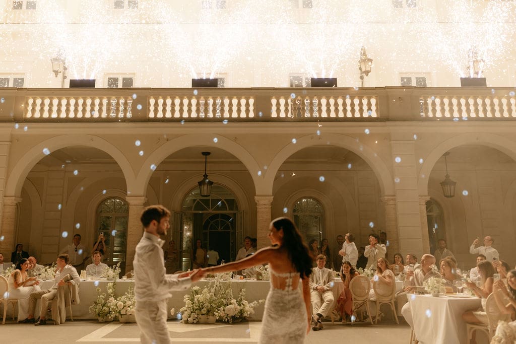 Newlyweds share a first dance at their destination wedding in Italy held at Villa Miani 